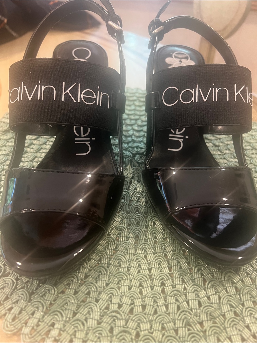 Worn 1x size 8 Calvin Klein Black Patent Slingback Sandals with Logo Strap.
